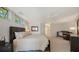 Spacious main bedroom with a large bed, neutral tones, and ample natural light, creating a relaxing retreat at 360 N Washington Dr, Sarasota, FL 34236