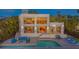 Backyard view of luxury home highlighting a pool, sun loungers, and comfortable seating at 360 N Washington Dr, Sarasota, FL 34236