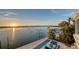 Stunning view of the waterfront pool and dock, perfect for enjoying sunsets and outdoor living at 360 N Washington Dr, Sarasota, FL 34236