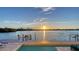 Beautiful waterfront pool with an expansive deck, ideal for relaxation and entertaining with sunset views at 360 N Washington Dr, Sarasota, FL 34236