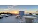 Expansive rooftop deck with seating and stunning waterfront views, perfect for entertaining and enjoying sunsets at 360 N Washington Dr, Sarasota, FL 34236