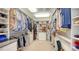 Organized walk-in closet with custom shelving and ample storage space for clothing, shoes, and accessories at 360 N Washington Dr, Sarasota, FL 34236