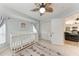 Inviting Bedroom with white crib and easy access to other living areas at 4415 Sylvania Ave, North Port, FL 34286