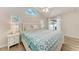 Cozy bedroom with a large bed, soft lighting, and serene decor at 4415 Sylvania Ave, North Port, FL 34286