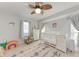 Adorable Bedroom with a crib, dresser, and playful decor at 4415 Sylvania Ave, North Port, FL 34286