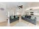 Spacious open concept living room with a view of the kitchen and dining area at 4415 Sylvania Ave, North Port, FL 34286