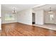 An open foyer features wood floors and natural light at 4529 Golden Gate Cv, Bradenton, FL 34211