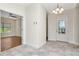Open foyer offers tile floors and a decorative glass front door at 4529 Golden Gate Cv, Bradenton, FL 34211
