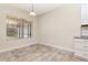 Bright kitchen nook with big window letting in lots of natural light and granite countertops at 4529 Golden Gate Cv, Bradenton, FL 34211