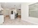 Modern kitchen features stainless steel appliances, granite countertops, and bar seating at 4529 Golden Gate Cv, Bradenton, FL 34211