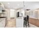 Modern kitchen features stainless steel appliances, granite countertops, and bar seating at 4529 Golden Gate Cv, Bradenton, FL 34211