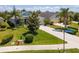 Charming home with well-manicured lawn, mature trees, and a long driveway at 4529 Golden Gate Cv, Bradenton, FL 34211