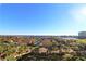 Aerial view of the intercoastal waterway, a golf course, and nearby buildings at 501 Haben Blvd # 704, Palmetto, FL 34221