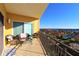 Balcony features furniture and a view of the intercoastal waterway and nearby buildings at 501 Haben Blvd # 704, Palmetto, FL 34221