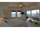 Sunny bedroom with balcony access offers stunning views of the cityscape and water at 501 Haben Blvd # 704, Palmetto, FL 34221