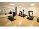 Well-equipped gym featuring modern exercise machines, free weights, and a mirrored wall for a complete workout experience at 501 Haben Blvd # 704, Palmetto, FL 34221
