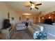 Spacious living area with bar seating, offering a relaxing atmosphere and natural light at 501 Haben Blvd # 704, Palmetto, FL 34221