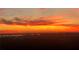 Vibrant sunset with orange and red clouds over the horizon, creating a dramatic and colorful skyscape at 501 Haben Blvd # 704, Palmetto, FL 34221