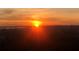 Beautiful sunset view with orange and yellow hues over the horizon, showcasing a tranquil setting at 501 Haben Blvd # 704, Palmetto, FL 34221