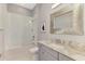 Bright bathroom featuring sleek vanity, and shower and tub combo at 5437 Manchini St, Sarasota, FL 34238