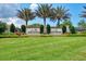 A beautiful entrance sign to Esplanade on Palmer Ranch with manicured landscaping at 5437 Manchini St, Sarasota, FL 34238