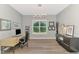 A functional home office with natural light and modern furnishings at 5437 Manchini St, Sarasota, FL 34238