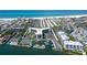 Stunning aerial showcases building, waterfront access, a tennis court, and proximity to the beach at 5855 Midnight Pass Rd # 512, Sarasota, FL 34242