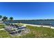 Beautiful community area with seating facing the bay, perfect for relaxing by the water at 5855 Midnight Pass Rd # 512, Sarasota, FL 34242