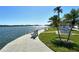 Picturesque waterfront community area with benches, a gazebo, and views of the bay, close to the docks at 5855 Midnight Pass Rd # 512, Sarasota, FL 34242