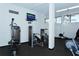 Well-equipped fitness center with modern exercise machines and TV for entertainment at 5855 Midnight Pass Rd # 512, Sarasota, FL 34242