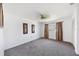 Spacious bedroom with neutral carpet, ceiling fan, and natural light at 6047 Arlene Way, Bradenton, FL 34207