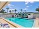 Community pool with mural and ladder at 6047 Arlene Way, Bradenton, FL 34207