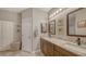 Neutral bathroom with granite-look countertops and updated fixtures at 6365 Jim Davis Rd, Parrish, FL 34219