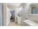 The bathroom features dual vanities, modern fixtures, and easy access to bedroom at 6365 Jim Davis Rd, Parrish, FL 34219