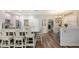 Open-concept kitchen featuring pendant lights, granite countertops and an island with barstool seating at 6365 Jim Davis Rd, Parrish, FL 34219