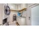 The laundry room features a washer and dryer, ample storage, and counter space at 6365 Jim Davis Rd, Parrish, FL 34219