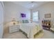 Cozy bedroom with white walls, a ceiling fan, and a queen-size bed at 6412 Golden Eye Gln, Lakewood Ranch, FL 34202