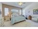 Spacious main bedroom with abundant natural light and a walk-in closet at 6412 Golden Eye Gln, Lakewood Ranch, FL 34202