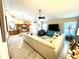 Open-concept living room and kitchen with modern finishes and plenty of space for entertaining at 6442 Barberry Ct, Lakewood Ranch, FL 34202