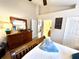 Spacious main bedroom with neutral tones, soft carpet, and an ensuite bathroom at 6442 Barberry Ct, Lakewood Ranch, FL 34202