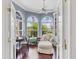 Serene sitting room with beautiful natural light and backyard views at 7011 Portmarnock Pl, Lakewood Ranch, FL 34202