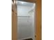 Walk in closet featuring ample storage, and new wood floor at 8617 Fancy Finch Dr # 102, Tampa, FL 33614