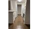 Modern kitchen featuring granite counters, stainless steel appliances, and wood floors at 8617 Fancy Finch Dr # 102, Tampa, FL 33614