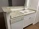 Kitchen sink and counter area showcasing granite countertops, stainless steel appliances at 8617 Fancy Finch Dr # 102, Tampa, FL 33614
