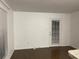 Living room featuring new flooring and a door to the outside patio at 8617 Fancy Finch Dr # 102, Tampa, FL 33614