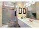 Bright bathroom featuring a tub shower combo and a vanity with ample counter space at 8715 52Nd E Ave, Bradenton, FL 34211