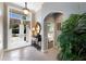 Welcoming foyer featuring elegant tile flooring, natural light, and an inviting view at 8715 52Nd E Ave, Bradenton, FL 34211