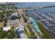 Overhead shot showcasing a waterfront property with a marina, docks, and nearby neighborhood at 1000 Riverside Dr # B501, Palmetto, FL 34221