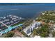 Aerial photo showcasing a marina filled with boats, with residences nearby in a coastal community at 1000 Riverside Dr # B501, Palmetto, FL 34221