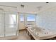 Outdated bathroom in need of renovation with a large tub, shower, and exterior access at 1000 Riverside Dr # B501, Palmetto, FL 34221